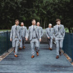 the groom and groomsmen walking to the service after planning a wedding in Hull