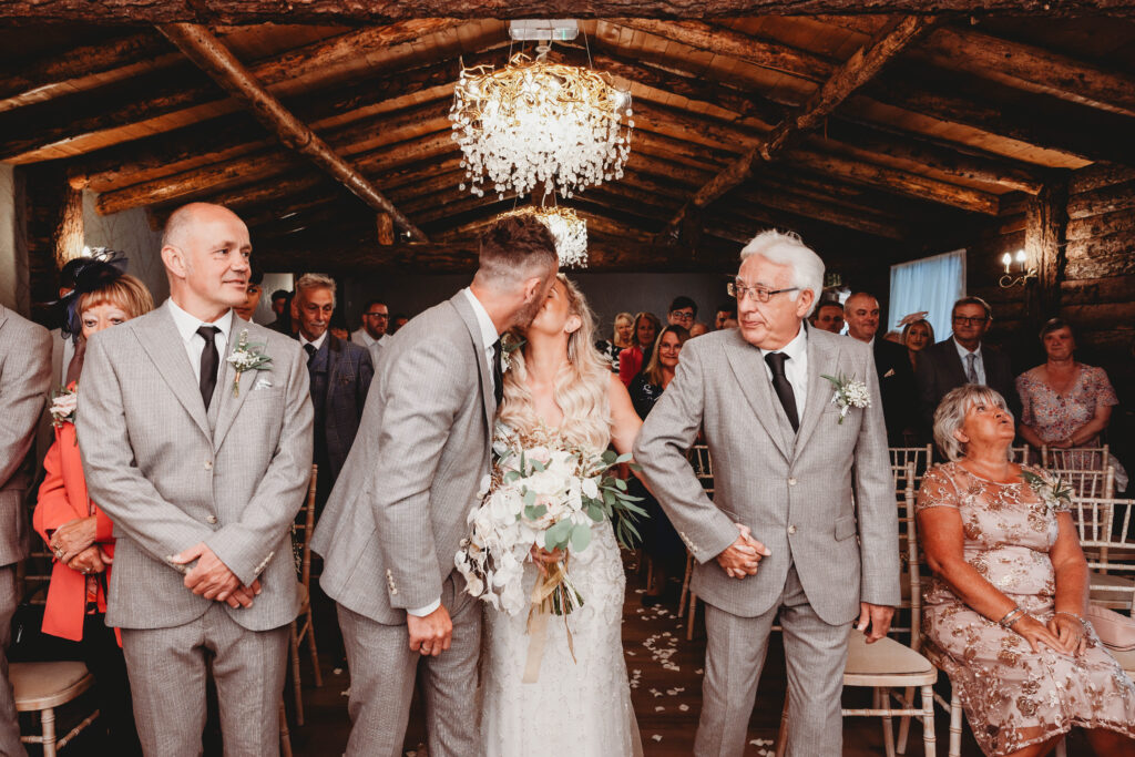 bride and groom kissing at their wedding, the moment captured by Wedding photographer and videographer in Hull